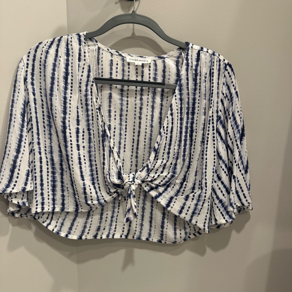 White and blue set. Top ties in the front and flowy shorts.